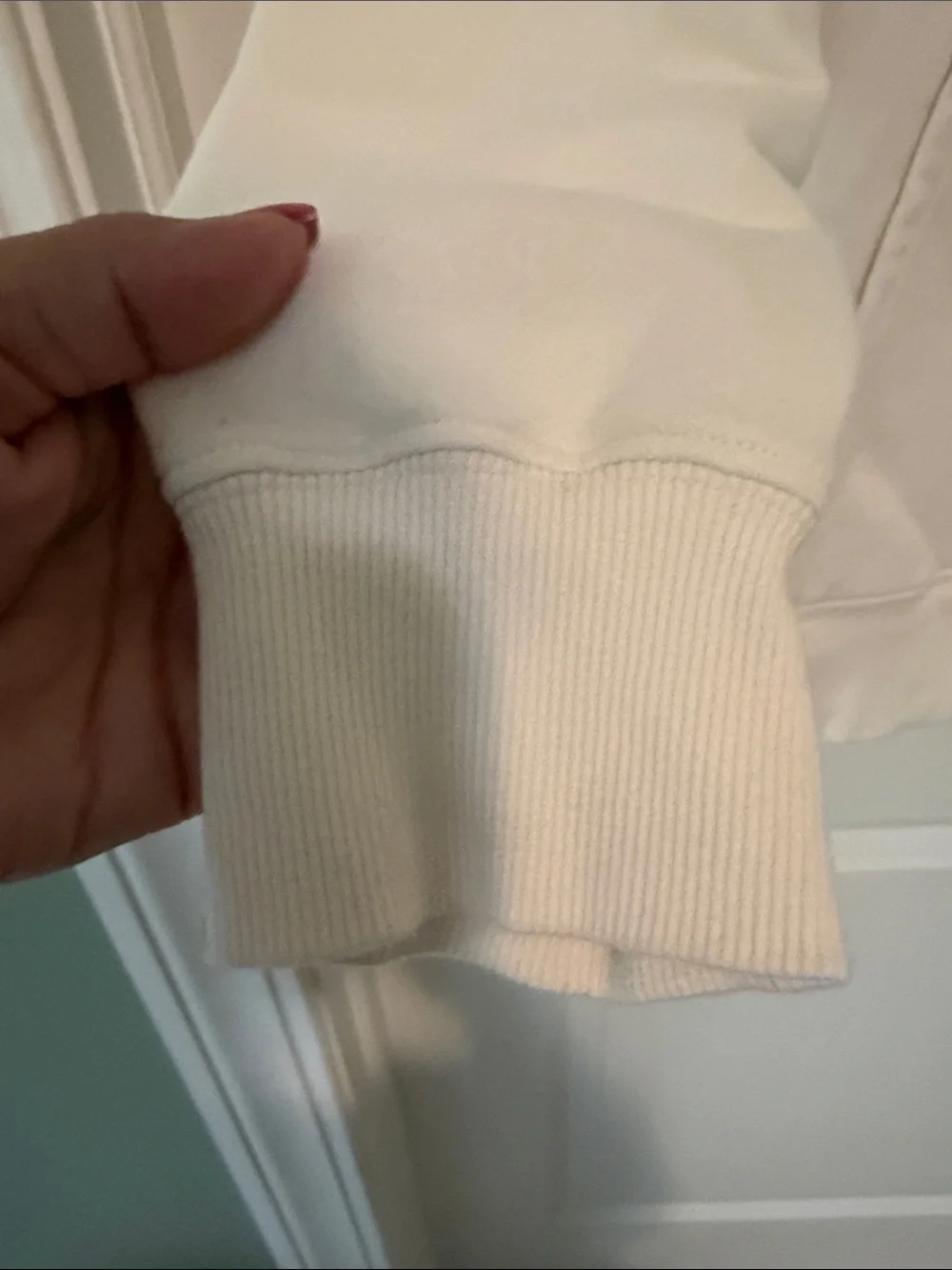 The North Face Cream Hoodie with Black Logo